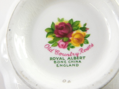 A quantity of Royal Albert Old Country Roses ceramics, to include dinner plates, napkin rings, etc. - 2