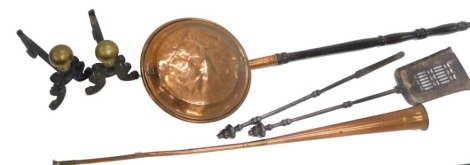 A quantity of metalware, to include a warming pan, two iron and brass fire dogs, matching fire shovel, and poker, and a hunting horn.