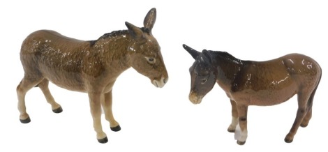 Two Beswick models of donkeys.