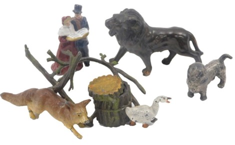 A cold painted Spelter ink stand, modelled with a fox and a goose, and other metal figures. (a quantity)