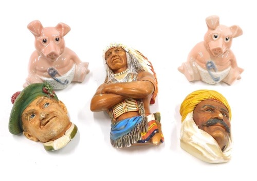 A quantity of collectable ceramics, to include a Wedgwood Looney Tunes figure, Wade pigs, Bosson's plaque, etc.