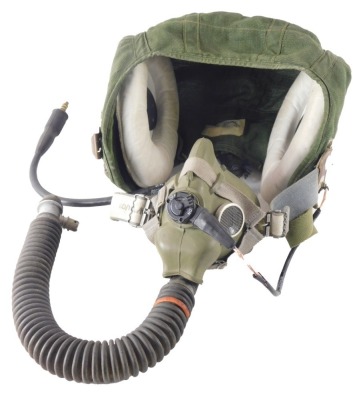 A military aviation green soft shell gas mask, size 3, with military arrow, bearing label.