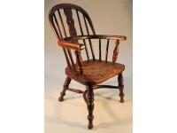 A child's Windsor chair with yew arms