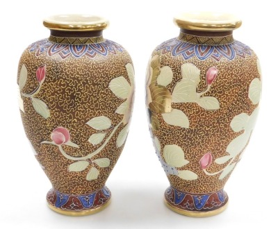A pair of 20thC Japanese Satsuma vases, of baluster form, decorated with ladies in a garden with oversized flowers, on a brown ground, signed, 32cm high. - 3