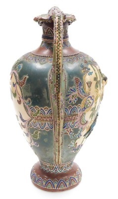 A Japanese Satsuma twin handled vase, decorated to the obverse in bas-relief with a figure in a boat, amongst bamboo, verso a reserve with flowers, Japanese numeral to the base, 43cm high. - 4