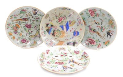 Three 19thC Chinese celadon glaze famille rose plates, decorated with pheasants, butterflies, flowers, and fruit, and a further plate decorated with Buddhist symbols and flowers, 26cm wide. (4)