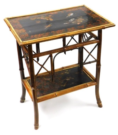 A late 19thC Japanese bamboo and lacquered two tier occasional table, of rectangular form, decorated to the top with birds and flowers, raised on outswept legs united by an undertier, similarly decorated, 72cm high, 62cm wide, 43cm deep.