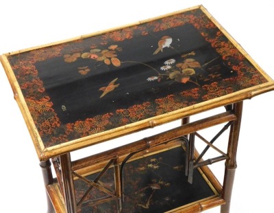 A late 19thC Japanese bamboo and lacquered two tier occasional table, of rectangular form, decorated to the top with birds and flowers, raised on outswept legs united by an undertier, similarly decorated, 72cm high, 62cm wide, 43cm deep. - 2
