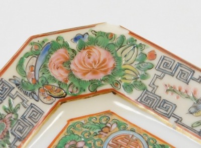 A 20thC Cantonese famille rose porcelain tea service, decorated with birds, butterflies and flowers, printed red China mark, comprising; teapot, sucrier, cream jug, sugar or slop bowl, pair of bread plates, eleven tea cups, nine saucers, and twelve tea pl - 19