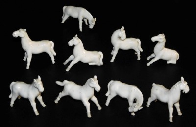 A group of Chinese export blanc de chine figures of horses, in various standing poses. (9, AF)