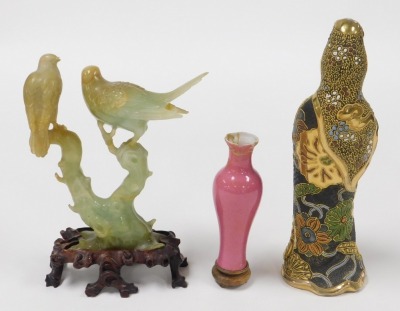 A group of Oriental ceramics and collectables, including a Japanese Satsuma figure of Guanyin, 23cm high, Cantonese famille rose porcelain rectangular box and cover, decorated with figures in an interior, birds and butterflies on a gilt ground, further cy - 7