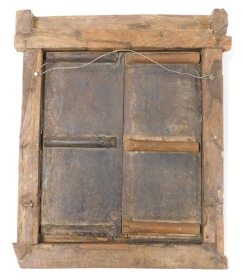 A 19thC Indian carved wood window shutter, with two doors, lock and hinges, 54cm x 45cm. - 4