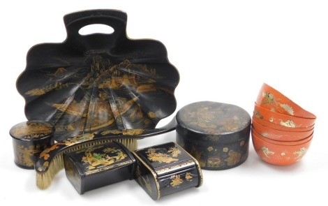 A group of Oriental lacquer wares, including rice bowls, a crumb scoop and brush, and three boxes.