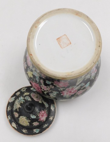 A group of Oriental ceramics, including a Chinese famille verte porcelain ginger jar and cover decorated with figures, famille noir vase and cover decorated with flowers, further vase and cover, etc. (5)