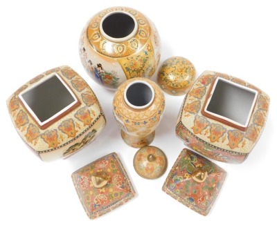 A pair of Satsuma vases and covers, of square curved form, decorated with reserve panels of figures in a garden, and flowers on a red ground, 33cm high, a ginger jar and cover, decorated with ladies in a garden, and flowers on a yellow ground, 25cm high, - 5