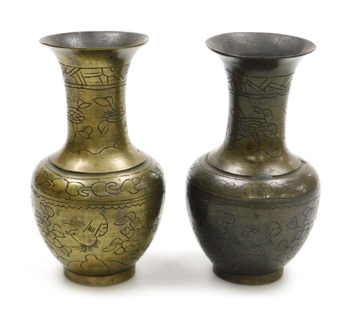 A pair of Chinese bronze vases, with engraved decoration of birds and flowers, six character Xuande seal marks, 19cm high.