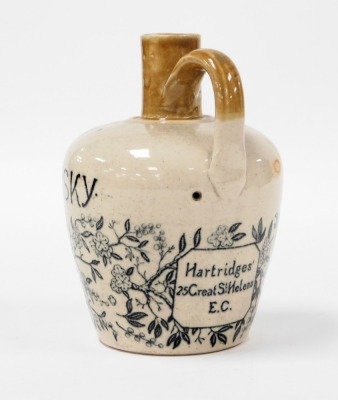 A late 19thC Port Dundas Pottery of Glasgow "Jeroboam" The Royal Blend whisky flagon, two colour stoneware, painted with a deer trademark centrally, branches with blossom, and reserve verso "Hartridges' 25 Great St Helens, E.C. impress marks, 17cm high. - 2