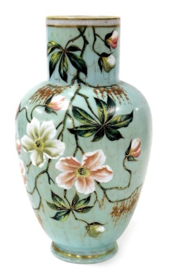 A late 19thC Continental turquoise glass vase, of shouldered ovoid form, painted with branches of flowers and leaves, 36cm high.