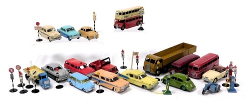 Dinky diecast vehicles, including cars, buses and trucks, traffic lights, road signs, petrol pump, etc. (a quantity)