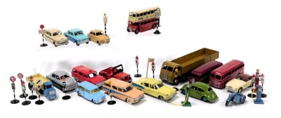 Dinky diecast vehicles, including cars, buses and trucks, traffic lights, road signs, petrol pump, etc. (a quantity)