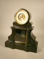 A 19thC French polished slate balloon mantel clock