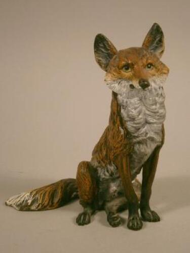 An Austrian cold painted bronze figure of a seated fox in the manner of Franz Bergman