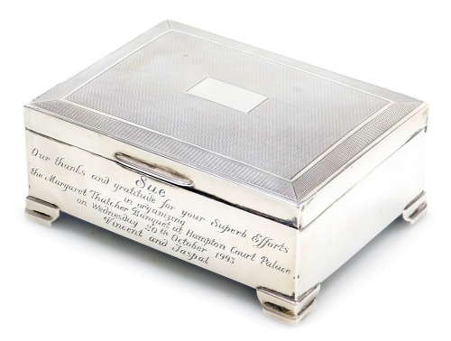 A silver cigarette box, hallmarks for Birmingham 1957,With engraved inscription relating to Margaret Thatcher approx 4cm high, 12cm wide, 9cm deep.