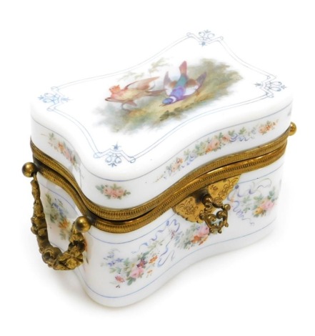 A late 19thC Continental milk glass casket, with brass mounts, escutcheon and floral wreath swing handles, of concave form, painted to the lid with flowers, the sides with floral sprays and ribbons, 15cm wide.