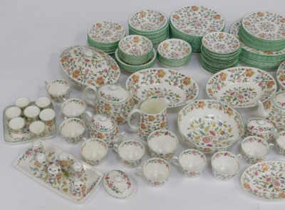 An extensive Minton tea and dinner service decorated in the Haddon Hall pattern, comprising twelve dinner plates, thirteen 9" plates, ten 8" plates, thirteen tea plates, fourteen 6.5" dessert bowls, twelve 5.5" dessert bowls, two oval tureens and covers, - 3