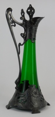 A WMF Art Nouveau pewter and green glass ewer and stopper, decorated with flowers and two maidens, stamped WMF, 42cm high. - 2