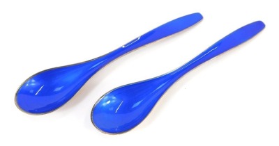 A pair of Norwegian silver and blue guilloche enamelled spoons, stamped verso J. Trostrup, Sterling, 15cm long.