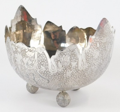 A Burmese white metal bowl, with shaped edge, the bowl decorated with leaves, flowers, etc., on three orb scaled feet, 19.2oz, 19cm diameter. - 2