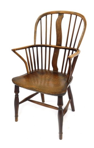 A late 19thC ash and elm Windsor chair, with spindle back, replacement splat, the solid seat raised on four turned legs, united by a H shaped stretcher, 98cm high.