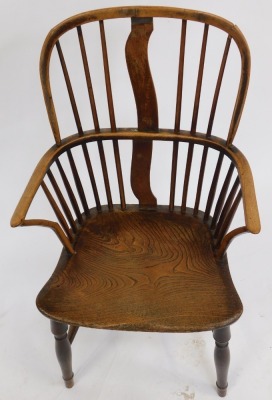 A late 19thC ash and elm Windsor chair, with spindle back, replacement splat, the solid seat raised on four turned legs, united by a H shaped stretcher, 98cm high. - 2