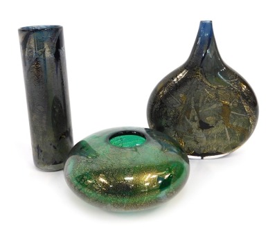 Three pieces of Isle of Wight glass, comprising a cylindrical vase, possibly Azurene, 14cm high, a squat vase, of cylindrical form, bearing label, 10cm diameter, and an Azurene lollipop vase, 14cm high.