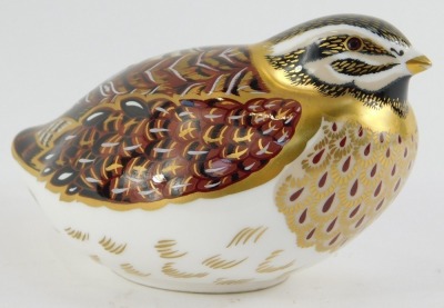 A Royal Crown Derby porcelain paperweight, modelled as a dappled quail, gold stopper, red printed marks, 6.5cm high. - 2