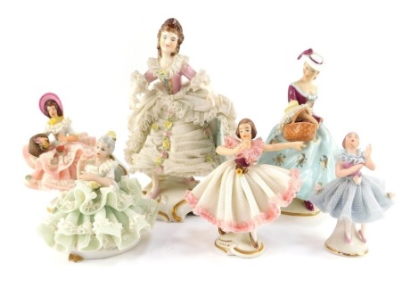 A group of Continental porcelain crinoline figures, to include Dresden, the largest 16cm high.