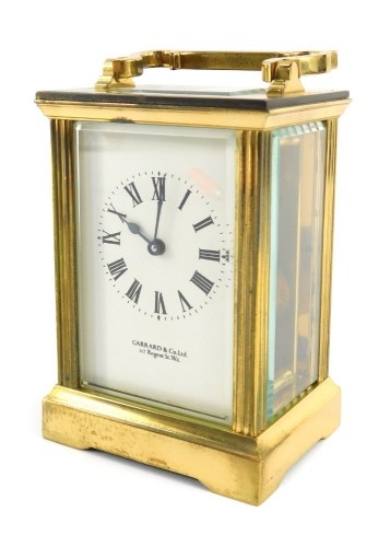 A 20thC brass carriage clock, the rectangular dial bearing Roman numerals for Garrard & Co Ltd, 112 Regent Street, W1, key wind with barrel movement, 12cm high.