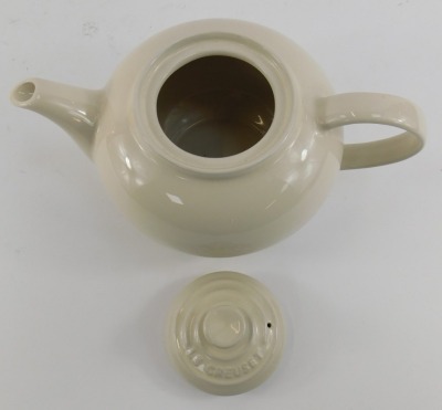 A Le Creuset pottery teapot, in cream, 12cm high. - 2