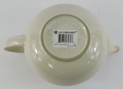 A Le Creuset pottery teapot, in cream, 12cm high. - 4