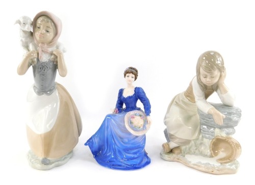 Two Nao porcelain figures, modelled as a young girl seated beside fallen milk pail, 20cm high, and girl with lamb on shoulders, 25.5cm high, together with a Coalport porcelain figure modelled as Rosemary, from The Ladies of Fashion Series. (3)