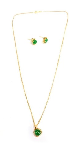 A jadite and diamond necklace and earring set, comprising pendant with star outer border, on a fine link neck chain, yellow metal stamped 375, 44cm long, with matching pair of earrings, on single pin backs, 6.9g all in.