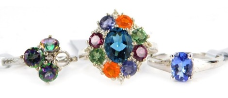 Three Gems TV dress rings, each set with multicoloured stones, white metal with tags stamped 925, with pouches. (3)