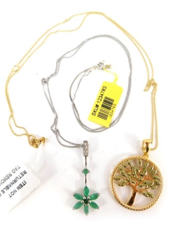 Three Gems TV pendants and chains, comprising a gold coloured tree of life, a green star pendant drop, and a cz set stone drop, white metal stamped 925, with tags and pouches.