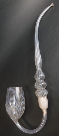 A Victorian glass Nailsea type whimsy pipe, pale pink glass scroll decoration, 74cm long.