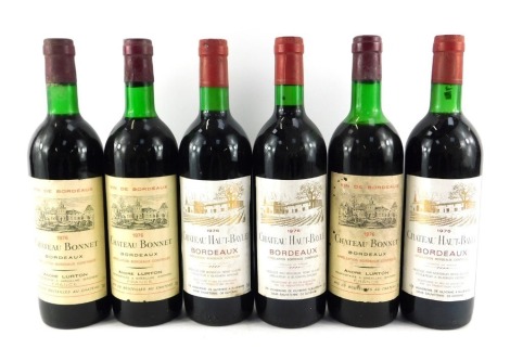 Three bottles of Chateau Haut-Bayle 1976 wine, together with three bottles of Chateau Bonnet 1976 red wine. (6)