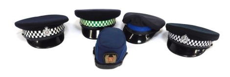 Five Police hats, comprising Massachusetts, Norfolk County Mills Police, Welsh, Scottish, Finnish, and one possibly for The Greenwich Constabulary Force.