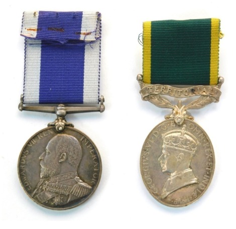 An Edward VII Royal Navy Long Service and Good Conduct medal, named to WH Wellington, 167045, Armr, relating to HMS Amphitrite, with ribbon, and a George VI Territorial Efficiency medal, named to Spr SF Coppins, 1435343, RE, with ribbon. We have specific 