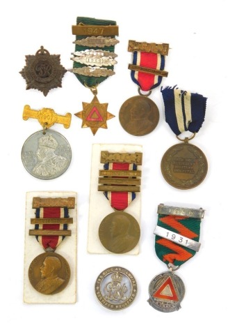 A World War One Services Rendered wound badge, numbered 322389, a Beech House Auxiliary Military Hospital medal, Edward VII punctual attendance medal, driving safety related medals, one hall marked silver, various Kings medals, etc. We have specific vendo