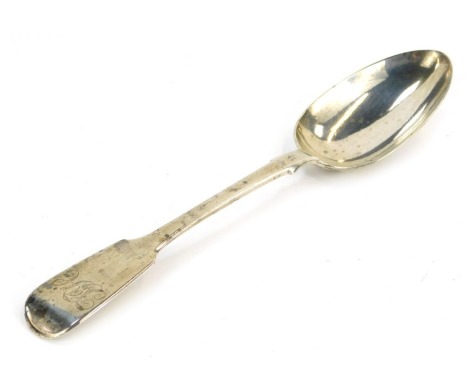 A Victorian silver fiddle pattern serving spoon, initial engraved, Henry Holland, London 1860, 2.11oz.